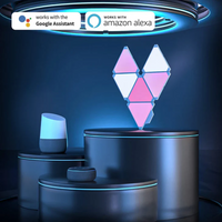 Cololight 6-piece smart triangle LED gaming lights on bedroom wall