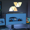 Cololight 6-piece smart triangle LED gaming lights on bedroom wall