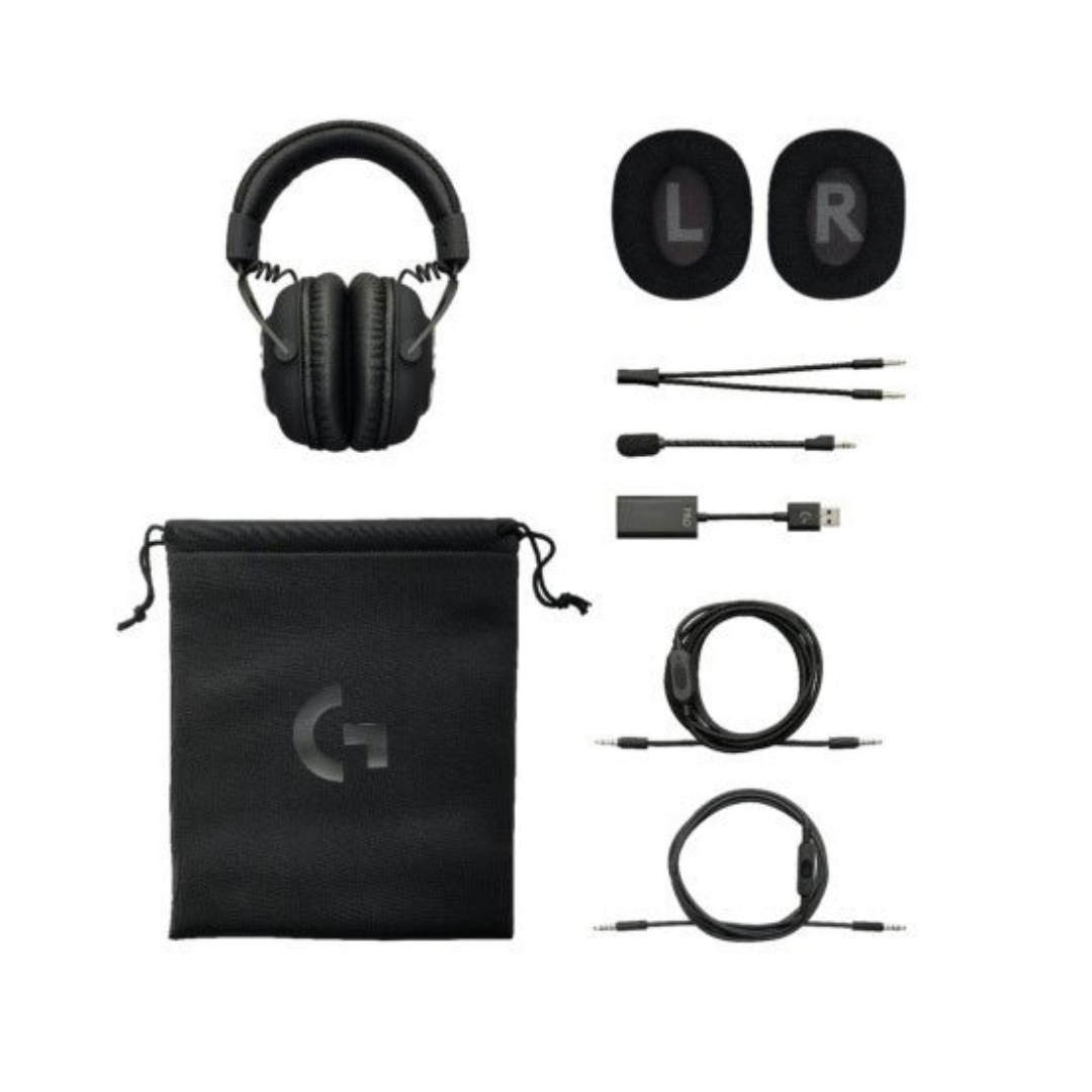 Black gaming headset with accessories including cables and a pouch on a white background